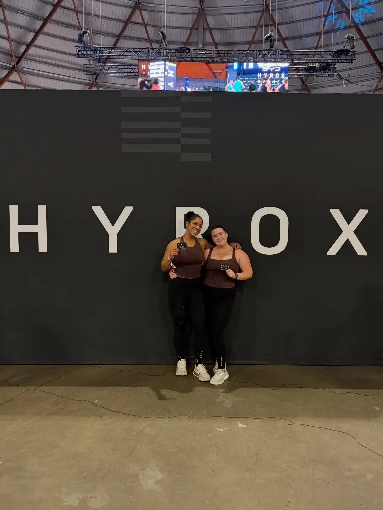 CrossFit Ulladulla teammates with their HYROX Sydney finisher tags