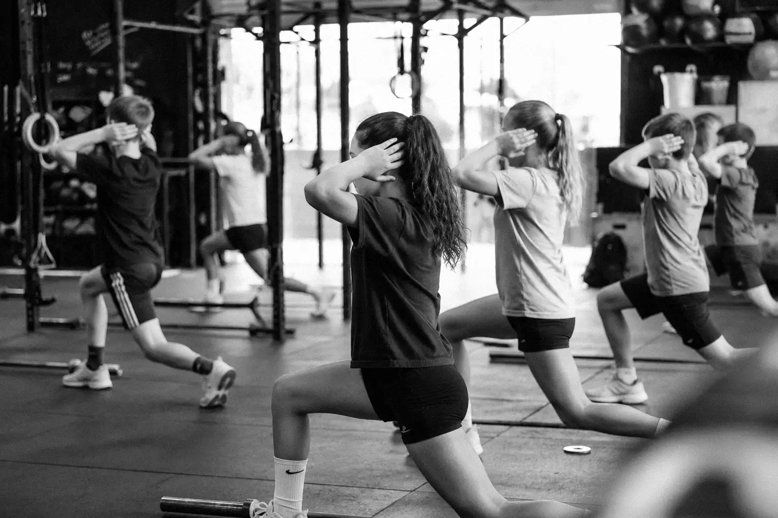 Young athletes training in a structured, coach-led Kids and Teens class